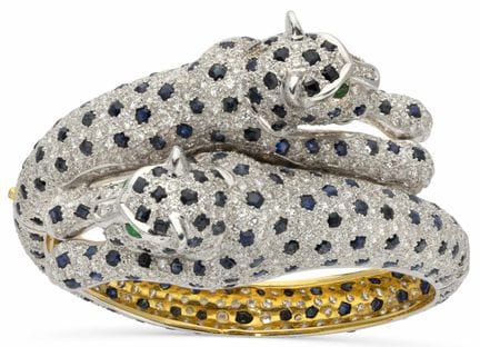 Bracciale “PANTHERS” in oro bianco e giallo 18 car