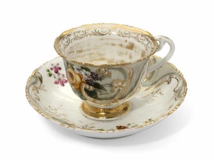 RUSSIAN PORCELAIN CUP AND SAUCER WITH FLORAL DECOR
