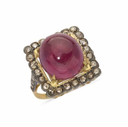 ANELLO IN ARGENTO DORATO CON DIAMANTI E RUBINO
Ane