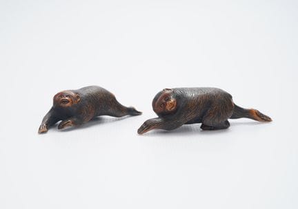 Japan, 19th century
Two okimono made of stained bo