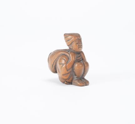 Japan, 19th century
Netsuke depicting a crouching 