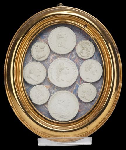 FRANCE, Oval frame containing nine plaster casts o