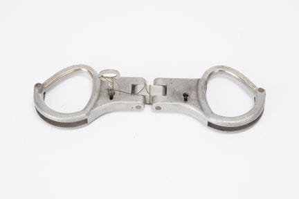 GERMANY, pair of rigid hinged aluminum handcuffs, 