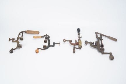 MISCELLANEOUS: Set of 4 cast-iron vise-mounted car