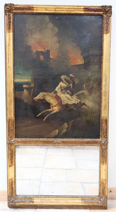 Trumeau en bois mouluré et doré à décor en partie 