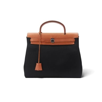 HERMÈS
Sac HERMÈS, modèle ''Herbag'' bicolor noir 