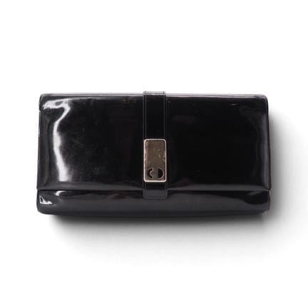 CHRISTIAN DIOR
Christian Dior 复古手拿包，黑色漆皮材质。手提款式。内胆