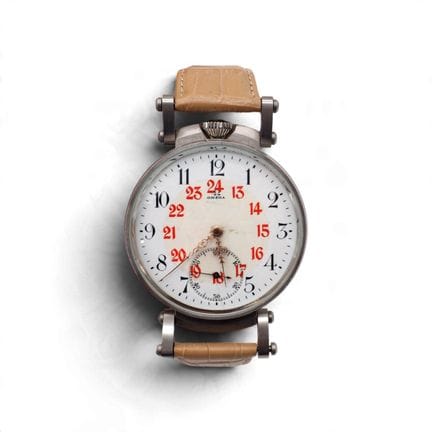 OMEGA
A pocket watch converted to a "trench watch"