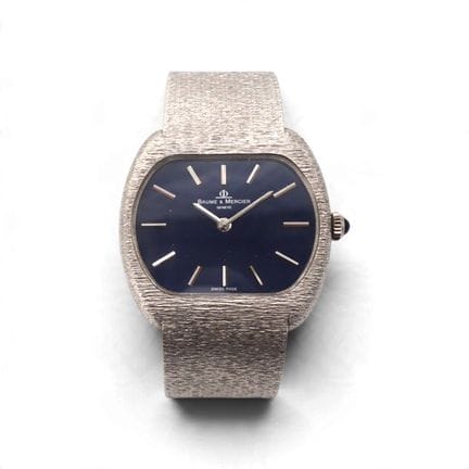 BAUME MERCIER
Cushion-shaped watch with a mechanic