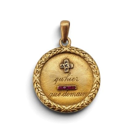 Pendentif en or jaune 18 K 750/1000, portant l'ins