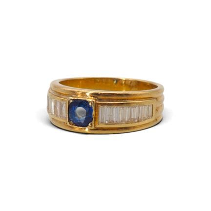 Bague en or jaune 18K, 750/1000, ornée de 18 diama