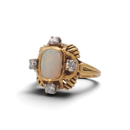 Bague en or jaune 18 K, 750/1000, ornée d'un caboc
