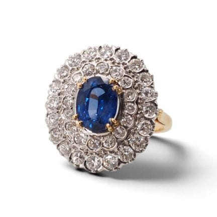 Bague en or jaune et or blanc 18 K 750/1000, serti