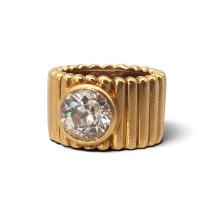 Bague en or jaune 18 K, 750/1000, sertie clos d’un