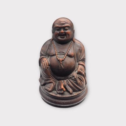 Statuette en bois sculpté représentant la divinité
