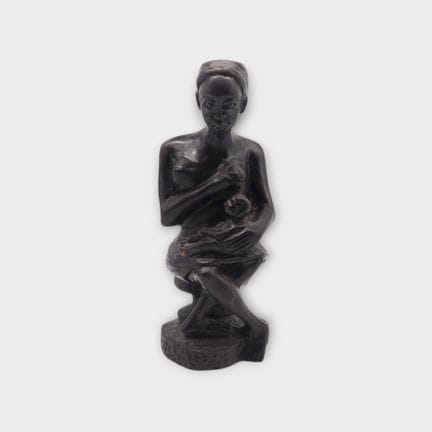 Statuette en bois sculptée représentant une figure