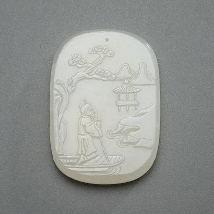 Plaque ou pendentif chinois en jade blanc sculpté,