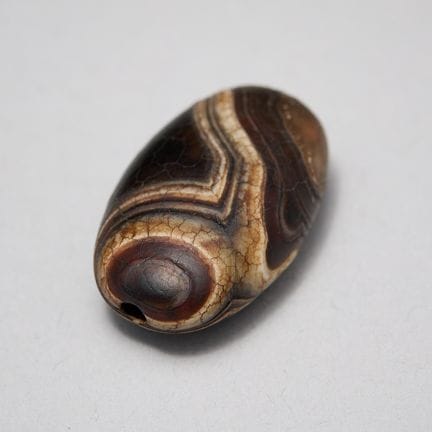 Perle « dzi » en agate Sulemani tibétaine ou himal