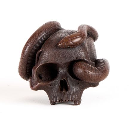 Netsuke « anabori » japonais sculpté dans du buis,
