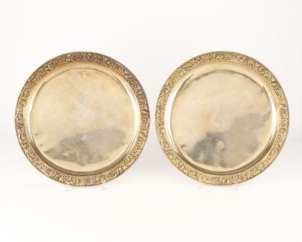 Pair of French silver gilt repousse floral dishes,