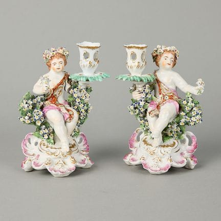 Derby, England. Pair of porcelain candlestick figu