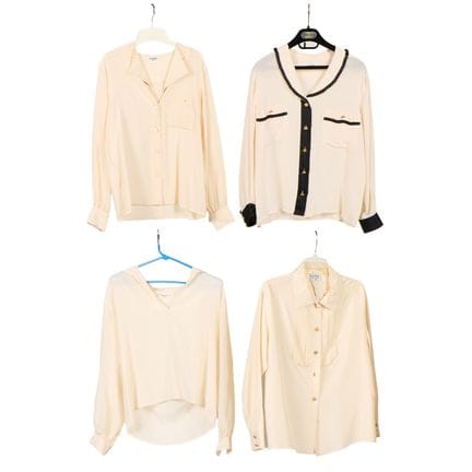 Four Chanel silk blouses in cream. Including an op