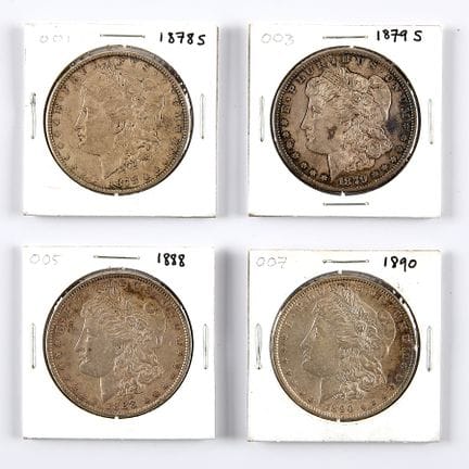 一套四枚摩根银元，包括：一枚1878-S、一枚1879-S、一枚1888年版和一枚1890年版。每枚