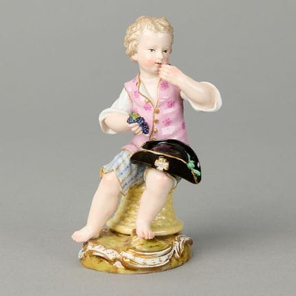 Meissen, Germany. Porcelain figurine of a boy as a