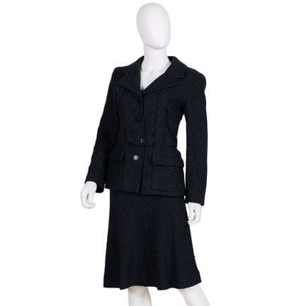 Navy Chanel tweed suit comprised of belted navy ja