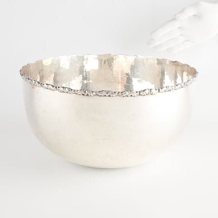 Large Egyptian silver punch bowl featuring ornate 
