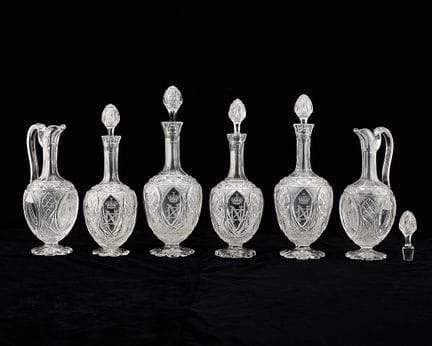 Set of six cut-crystal decanters and ewers with fi