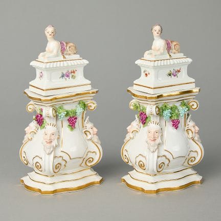 Meissen, Germany. Pair of sphinxes on pedestals wi