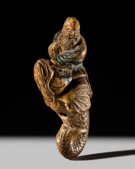 UN IMPRESIONANTE NETSUKE SAISHIKI DE KINKO SENNIN,