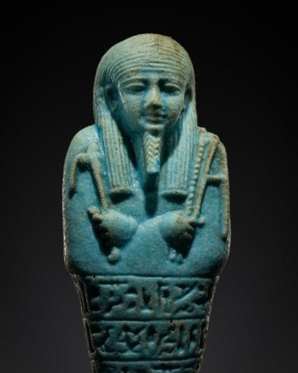 UN SHABTI EN FAÏENCE TURQUOISE CLAIRE, DE BELLE FA