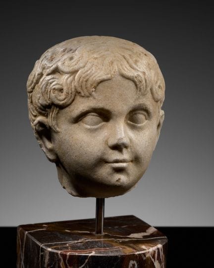 UNA BELÍSIMA CABEZA DE MARMOL DE UN NIÑO, IMPERIO 