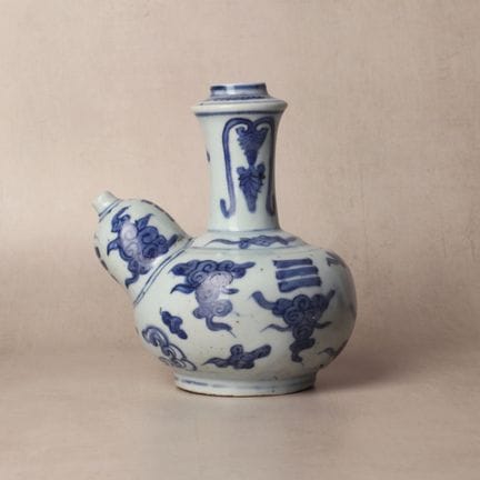 A Chinese blue and white 'ruyi cloud' kendi, Ming 