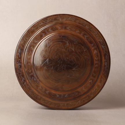A rare Chinese incised brown lacquer 'mythical bea