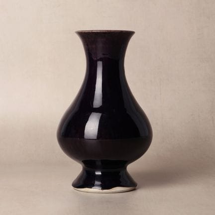 A Chinese monochrome aubergine-glazed vase, 17th c