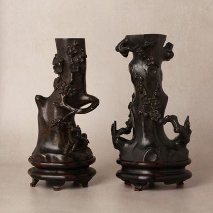 A pair of Chinese bronze 'prunus' vases, late Ming