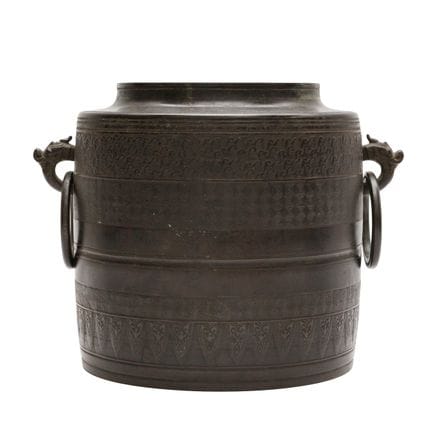 A Chinese bronze twin-handled pot, Qing dynasty 清 