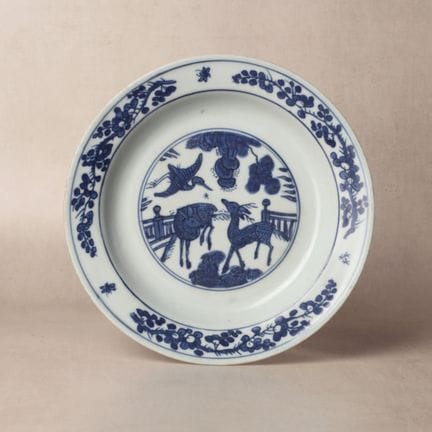 A Chinese blue and white 'deer and crane' dish, Mi