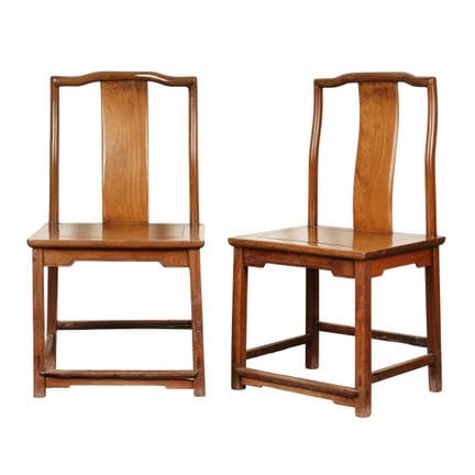 A pair of Chinese hongmu yoke-back side chairs, de