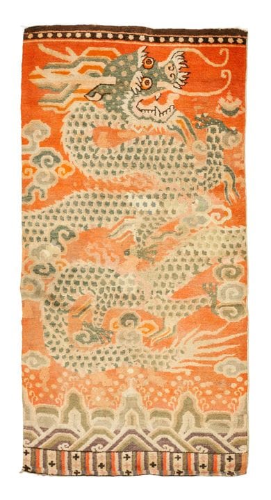 A Chinese Ningxia 'dragon' rug, Qing dynasty, 18th