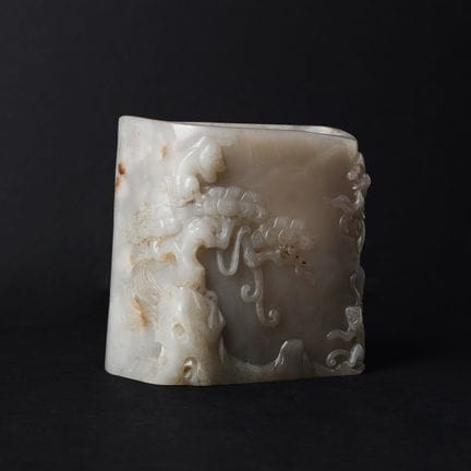A Chinese grey jade 'monkeys' brush pot, late Qing
