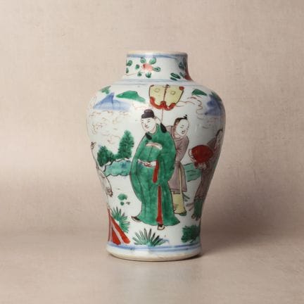 A Chinese wucai 'official and attendant' vase, 17t