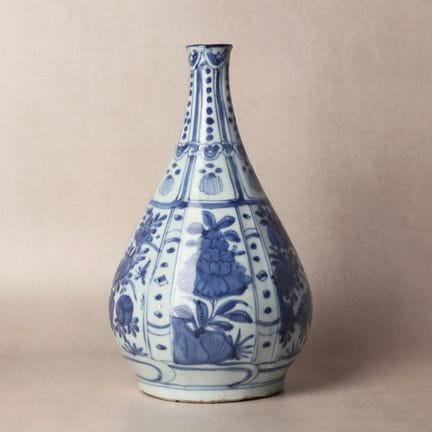 A Chinese blue and white 'Kraak' bottle vase, Ming