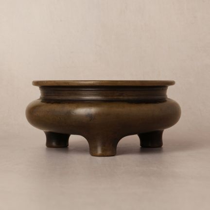 A Chinese bronze tripod censer, Qing dynasty, 19th