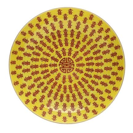 Un plat chinois à fond jaune orné du motif « doubl