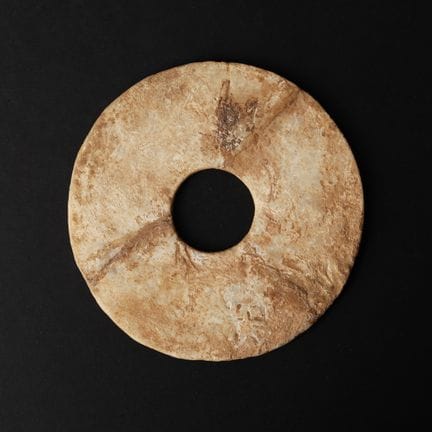 Un disque bicône en verre chinois, dynastie Han 漢 