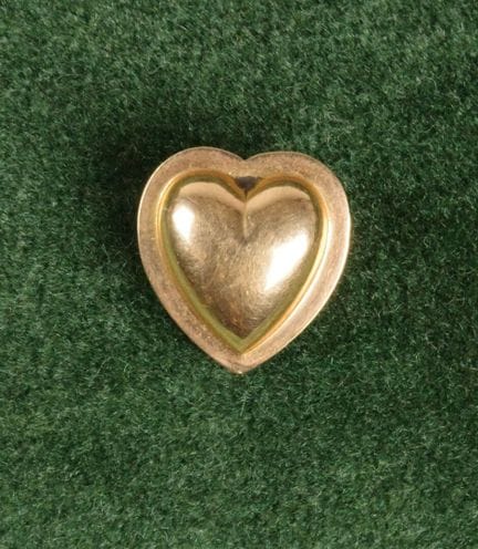Petit coeur coulant en or jaune 750. Poinçon Tête 